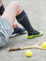 Sports compression socks with DriRelease®, black with green details