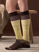 Bamboo compression stockings, brown and yellow with face