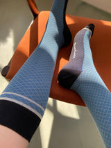 Wool compression stockings, blue and black with white grid