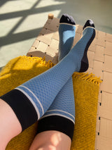 Wool compression stockings, blue and black with white grid