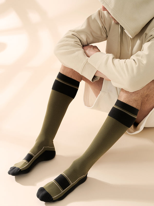 Sports compression socks, forest green with grey details